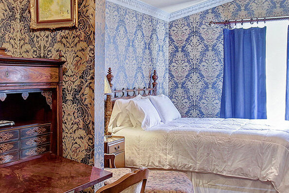 Victorian Bedroom with Carved Antique Bedroom Furnishing
